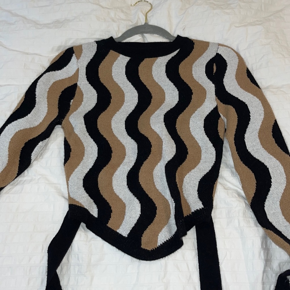 Multi color sweater with tie in back